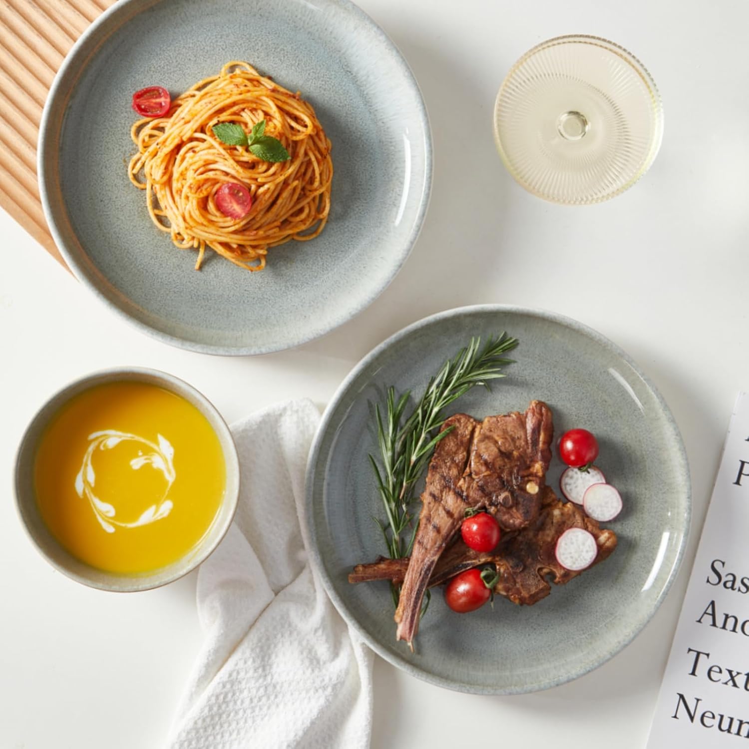 Close-up of reactive glaze on Sorevia handmade ceramic plate showing gradient green tones
