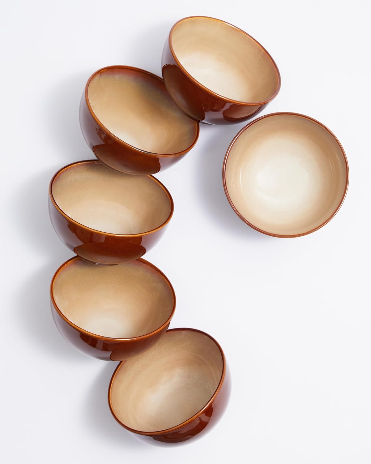 Sorevia stoneware bowls filled with cereal and fruit for breakfast setting