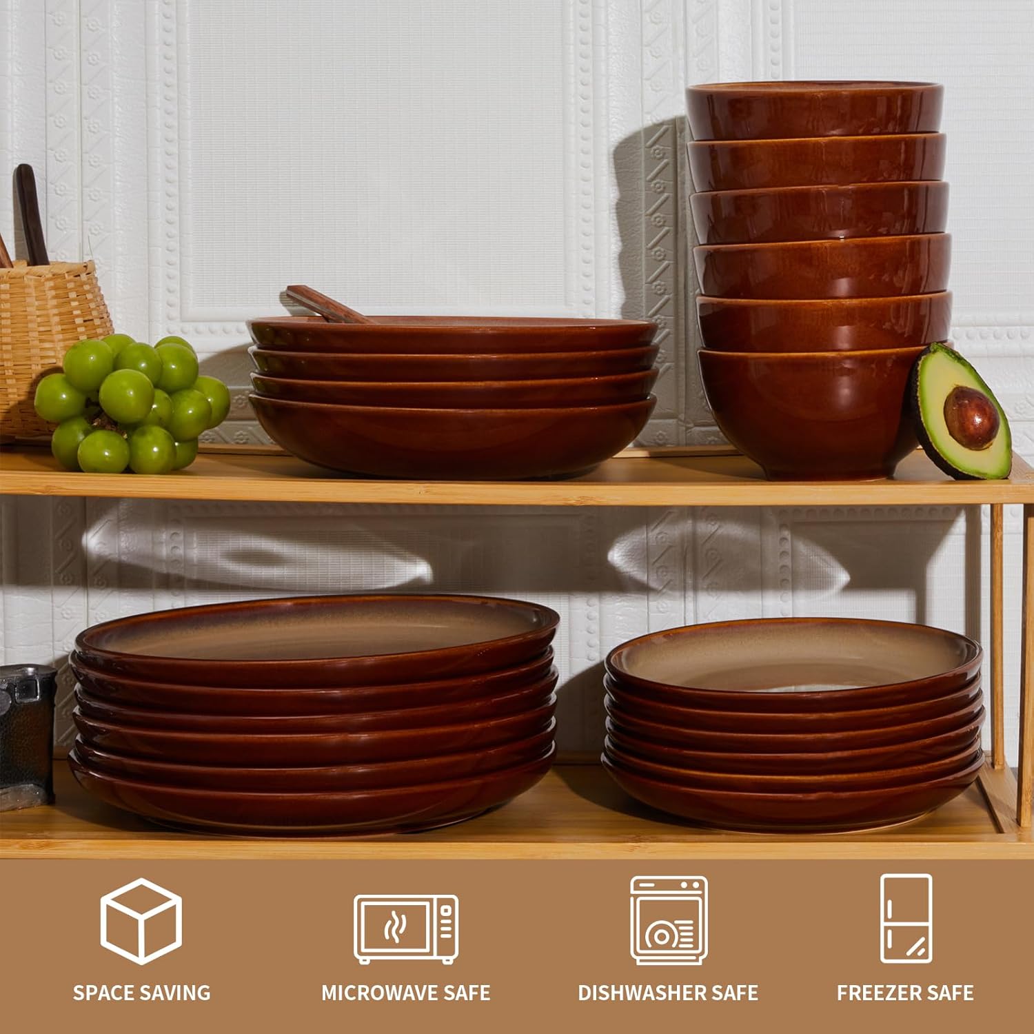 Stacked handmade Sorevia plates and bowls showing glossy textured glaze